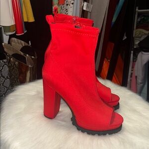 Brand new peep toe boots.